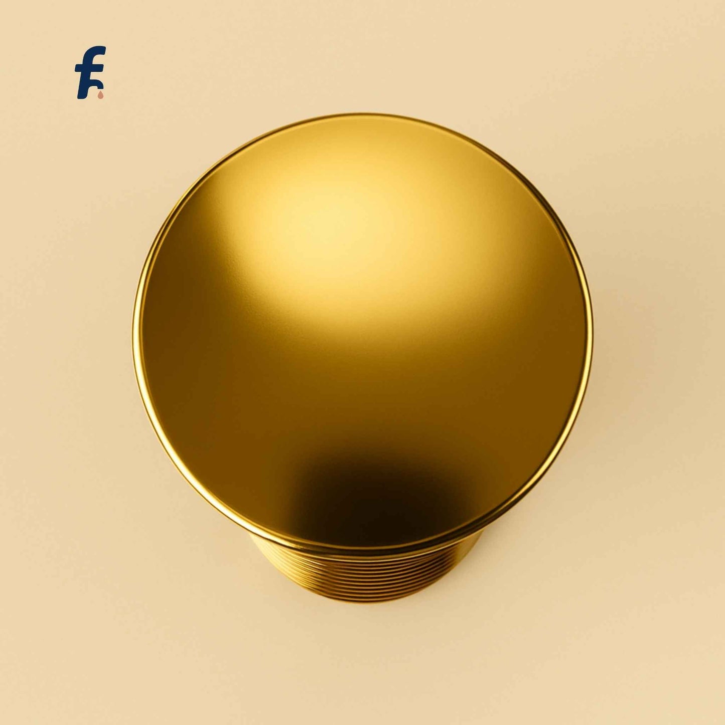 Top angle of gold pop-up drain stopper for designer basins