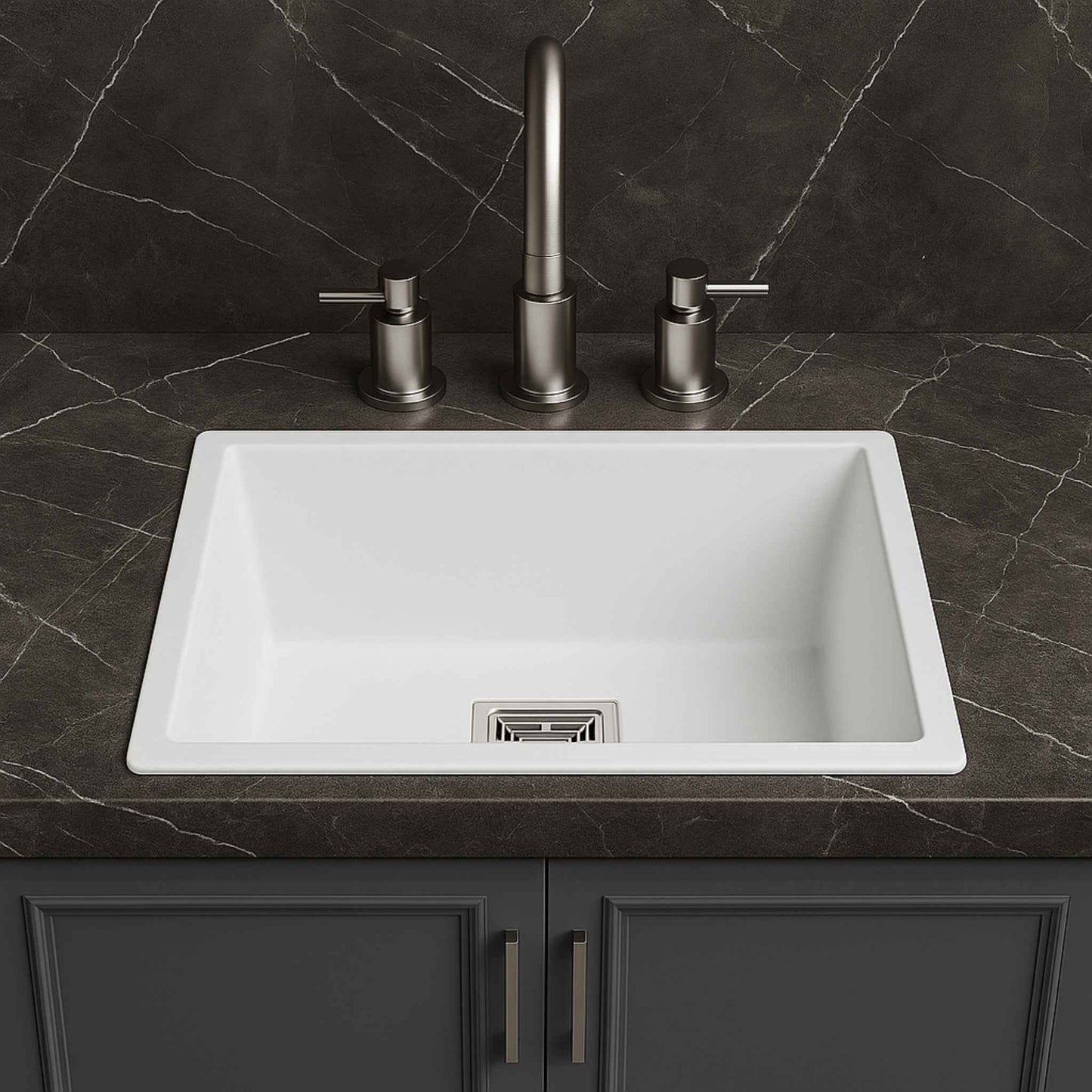 Front angle of premium white granite kitchen sink placed in a luxurious kitchen with dark Italian marble.