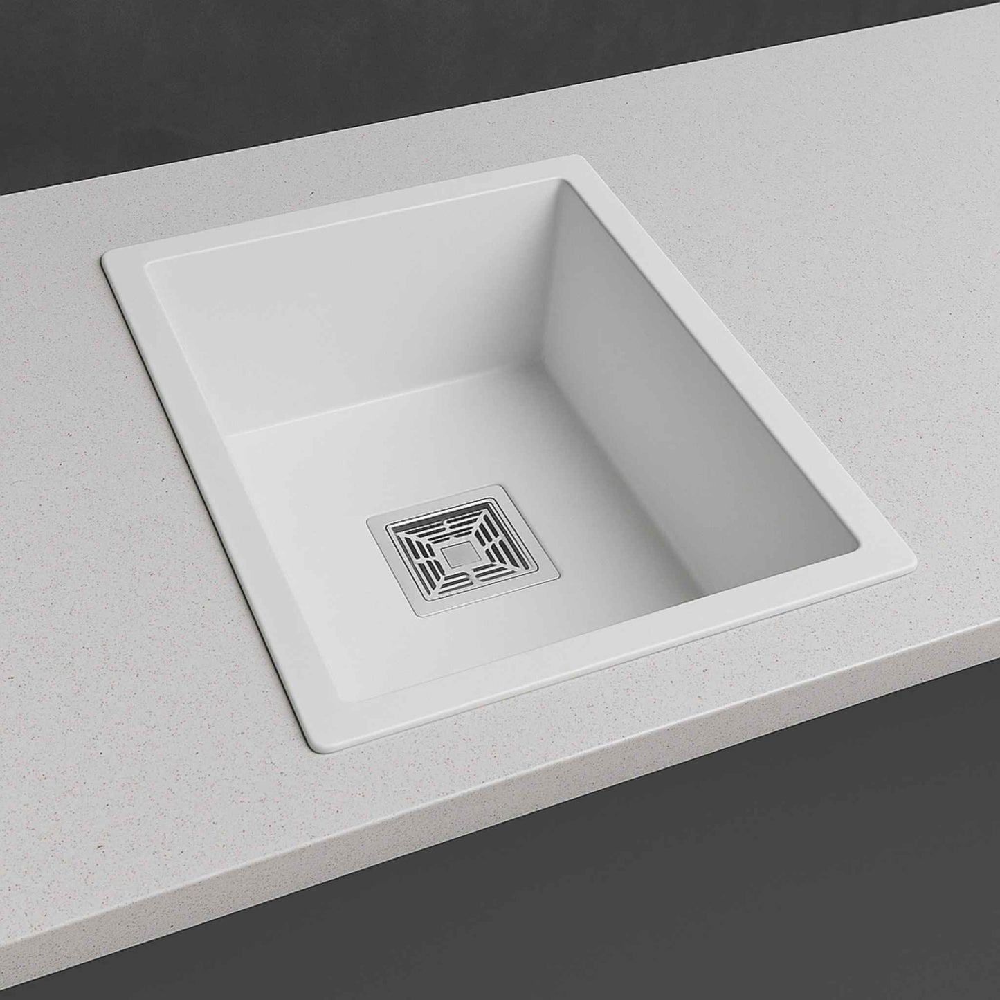 Side angle view of 18x24x9 white kitchen sink in a modern kitchen with premium marble design.
