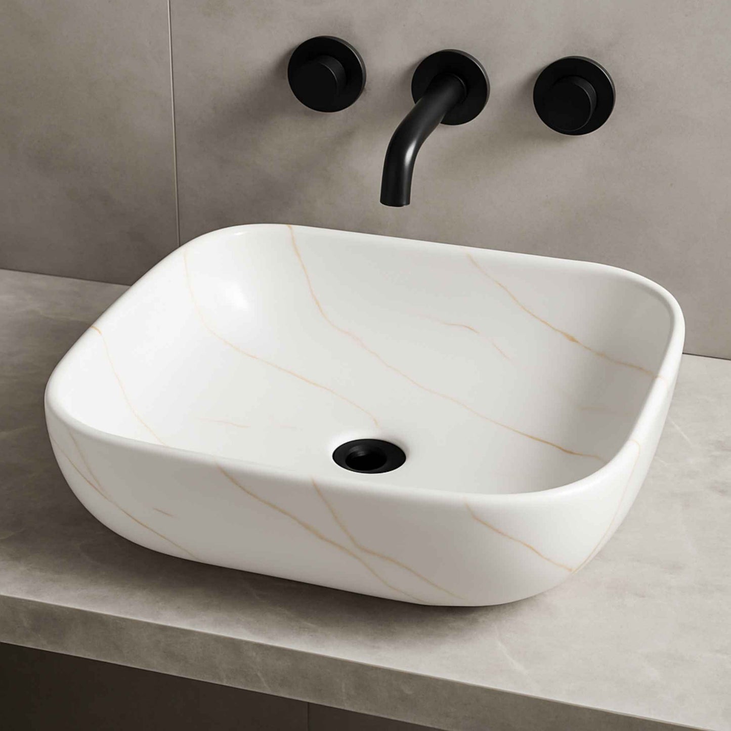 Front view of white marble finish rectangular countertop wash basin placed on a luxurious vanity