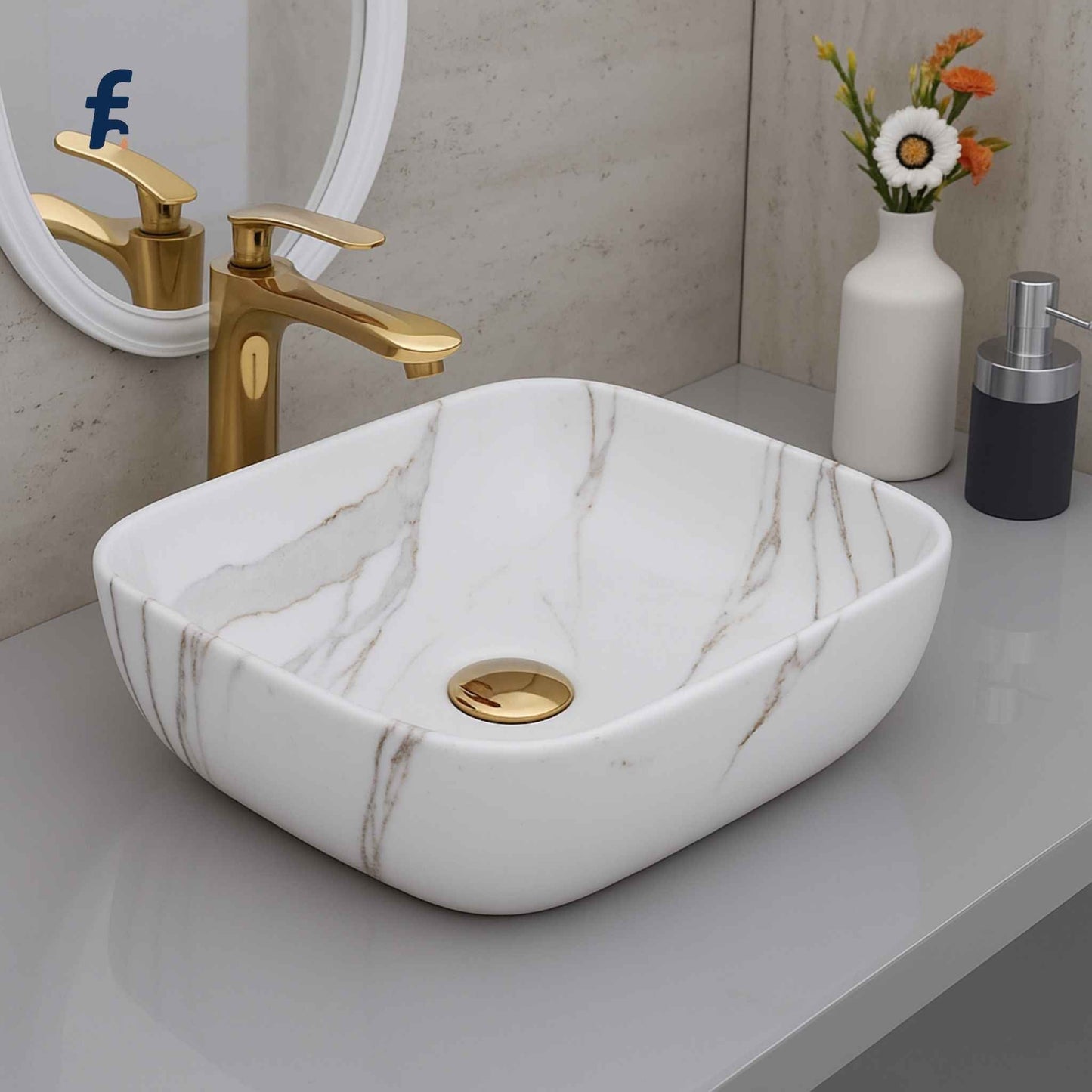 18x13 white marble finish wash basin with grey veins – front angle view with gold faucet