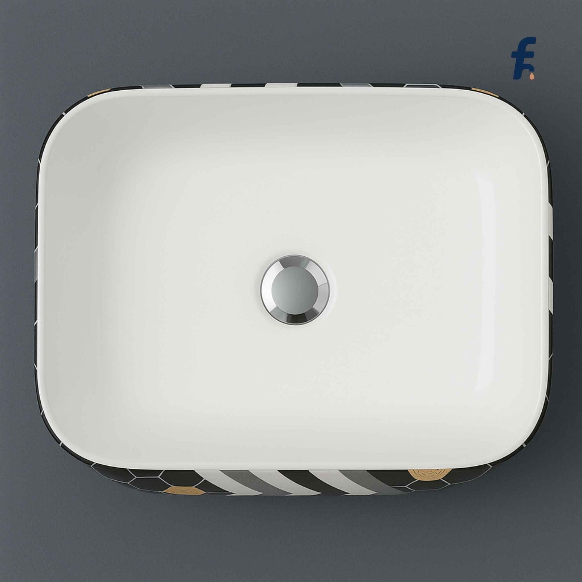 White electronic device with a circular button on a dark gray background