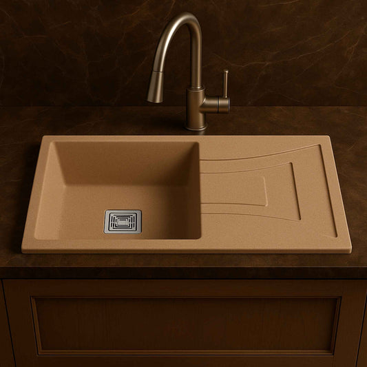 Side angle of almond quartz sink with pull-out faucet on Italian marble platform