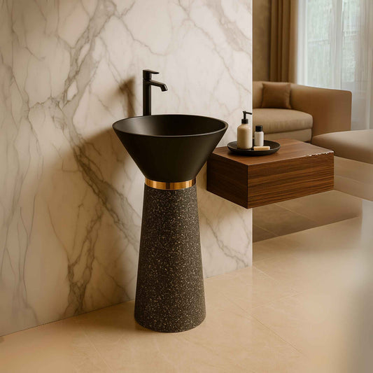 Pedestal cone basin in modern bathroom with marble wall and wooden counter