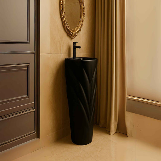 Stylised angle of black pedestal washbasin complementing luxury space