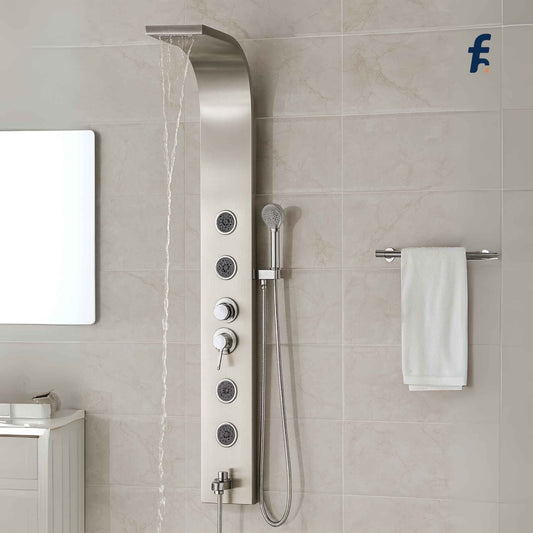 Shower panel system with multiple control buttons and a handheld shower head mounted on a tiled bathroom wall. Spacious bathroom featuring luxury chrome shower panel with curved design and multiple jets