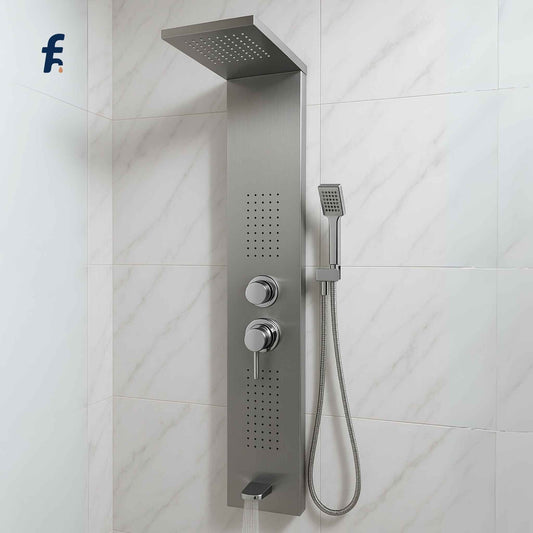 Stainless steel shower panel with multiple nozzles on a tiled wall, Top angle view of chrome rainfall shower panel mounted on marble wall.