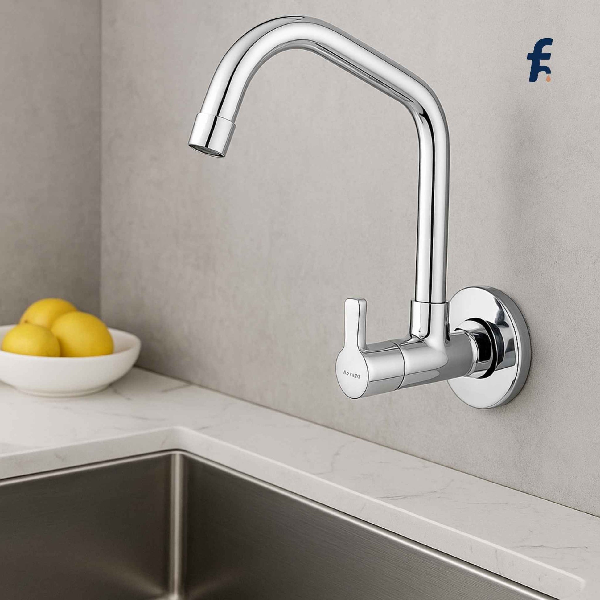 Modern kitchen faucet mounted on a gray wall above a sink with a bowl of lemons. Chrome sink cock with extended swinging spout and wall flange – affordable wall-mounted kitchen faucet from StreamLite Series"