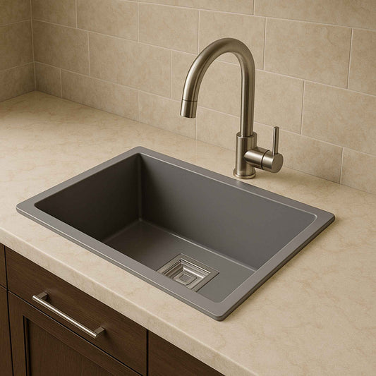 Front view of grey metallic kitchen sink with nickel faucet