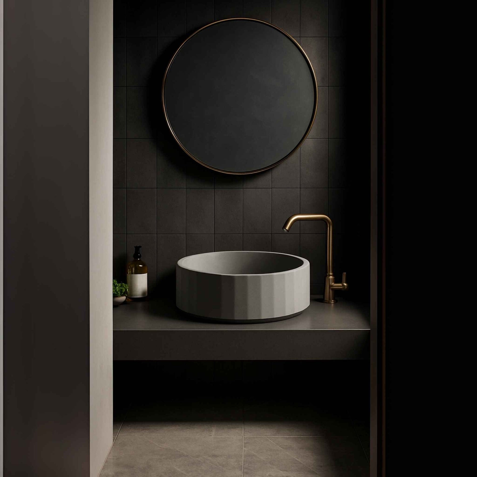 Side angle view of a grey fluted round concrete basin in a designer vanity setup