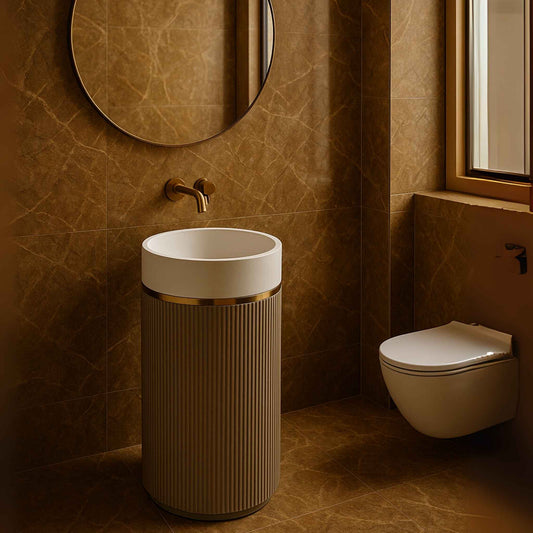 Bathroom with a cylindrical sink and round mirror on a brown tiled wall.