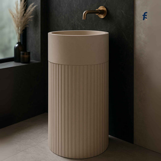 Beige freestanding sink in a modern bathroom setting