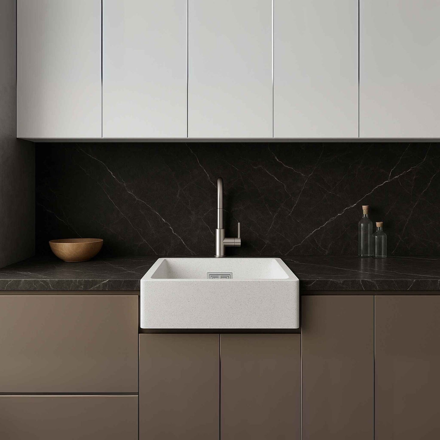 Full kitchen view with white granite sink and dark Calacatta marble countertop