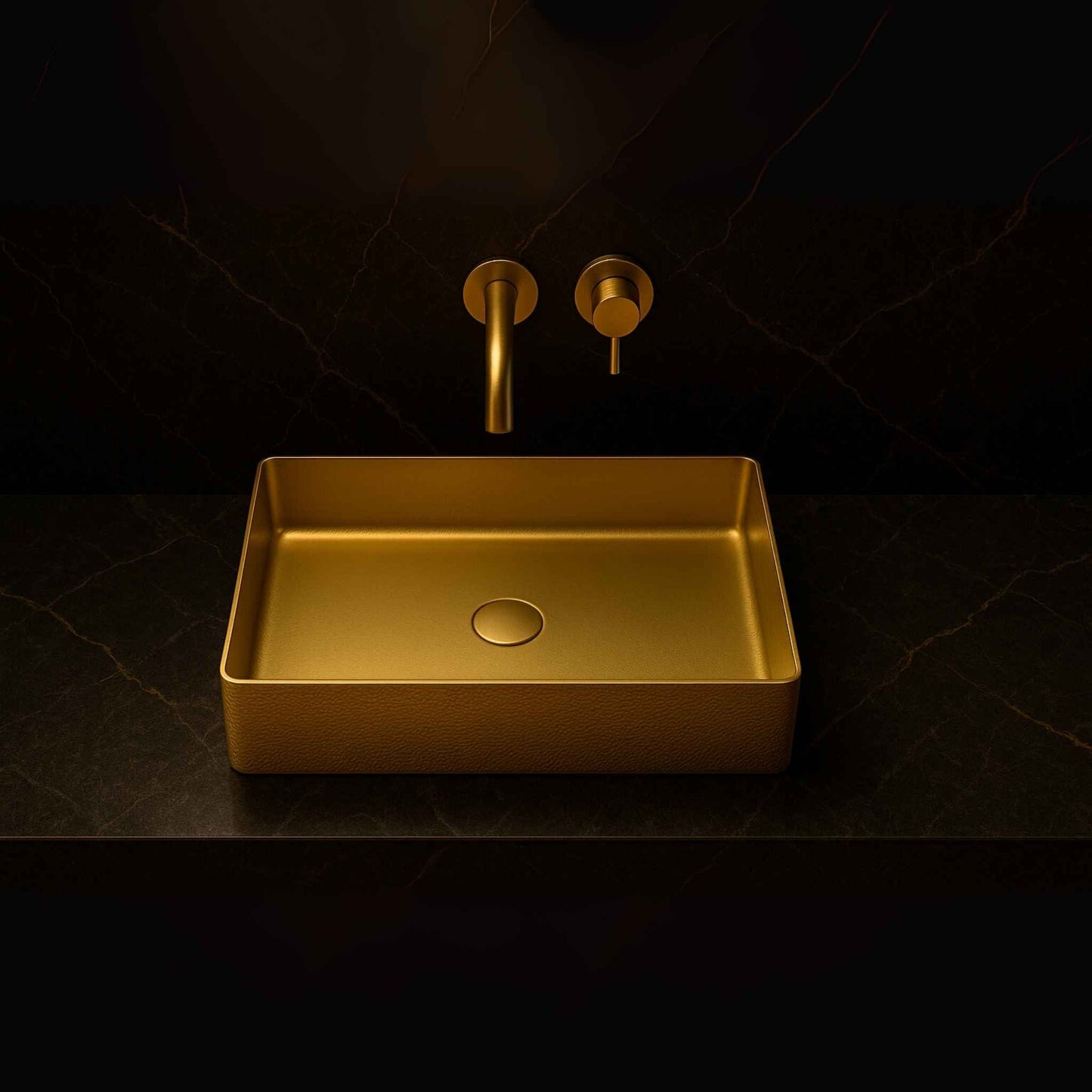 Top angle of hammered gold rectangular wash basin in designer setting