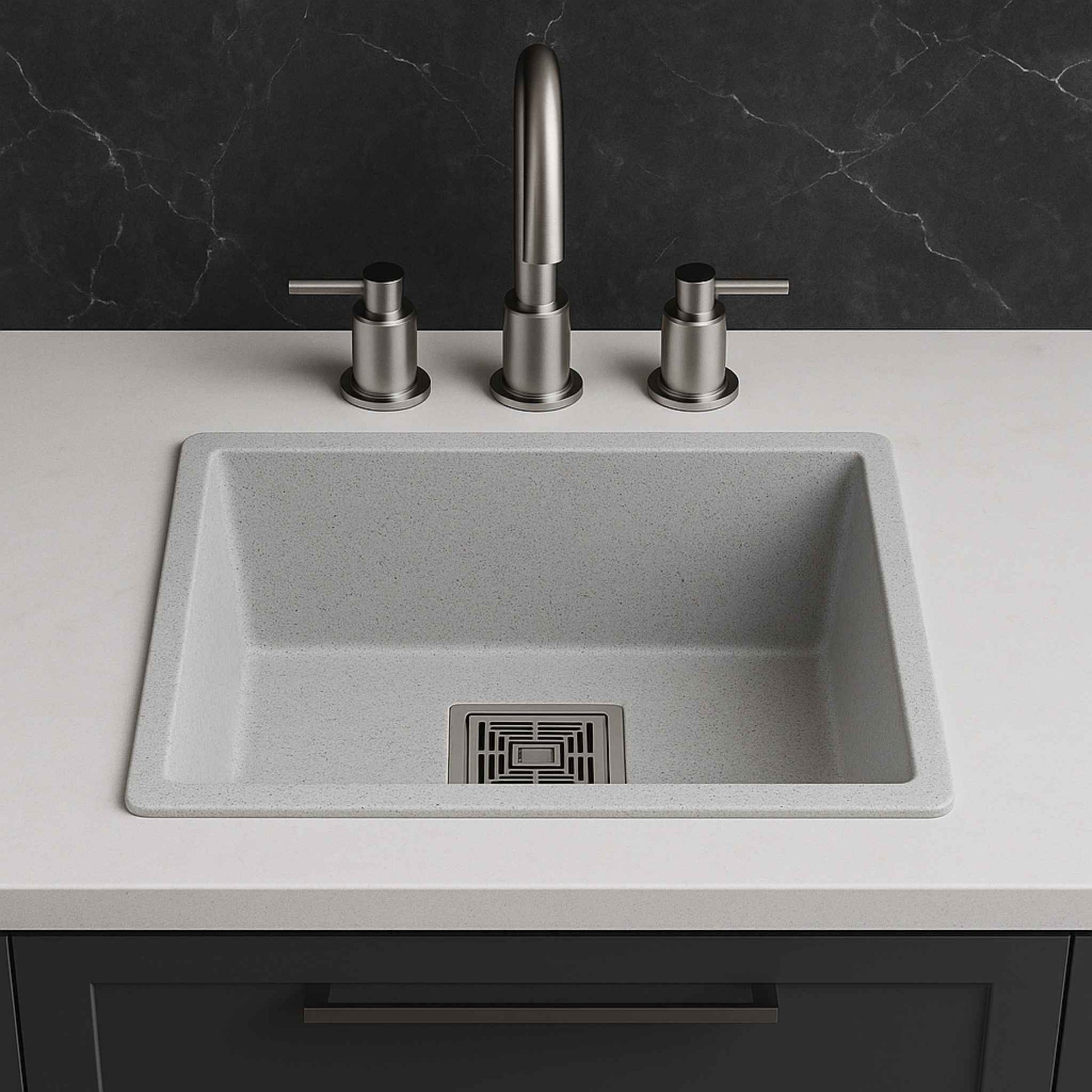 Full kitchen view featuring grey granite sink with dark Calacatta marble countertops