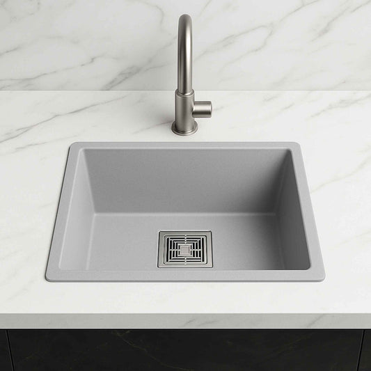 Front view of grey metallic kitchen sink 18x24x9 inches installed in a luxurious white marble kitchen