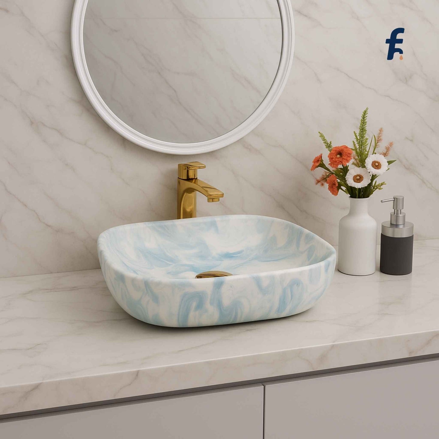 Bathroom vanity with a marble-patterned sink, gold faucet, and decorative elements, Full vanity setup with blue marble ceramic wash basin.