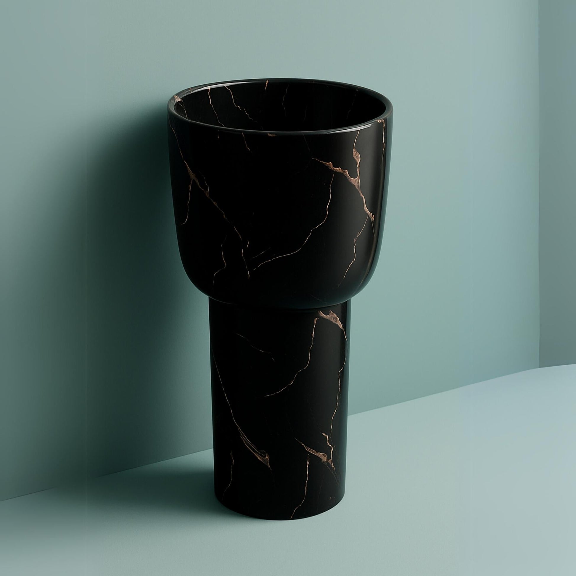 Luxury black marble pedestal washbasin with veined stone finish for designer bathrooms side angle