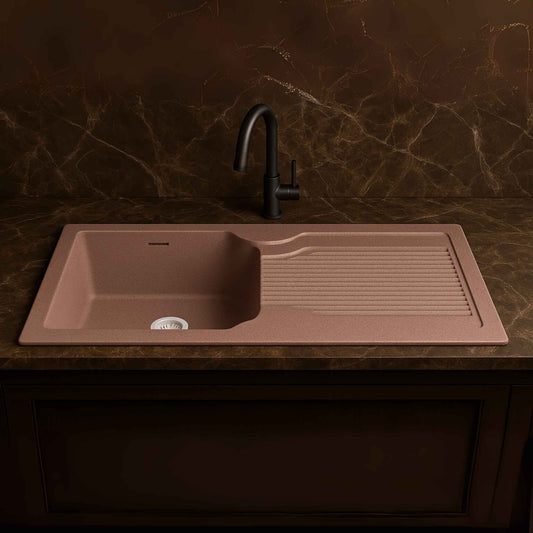 Front angle view of rose granite kitchen sink with drainer in luxury kitchen