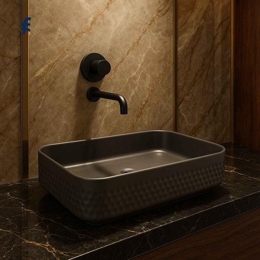 Front angle view of matte grey ceramic wash basin with wall-mounted faucet