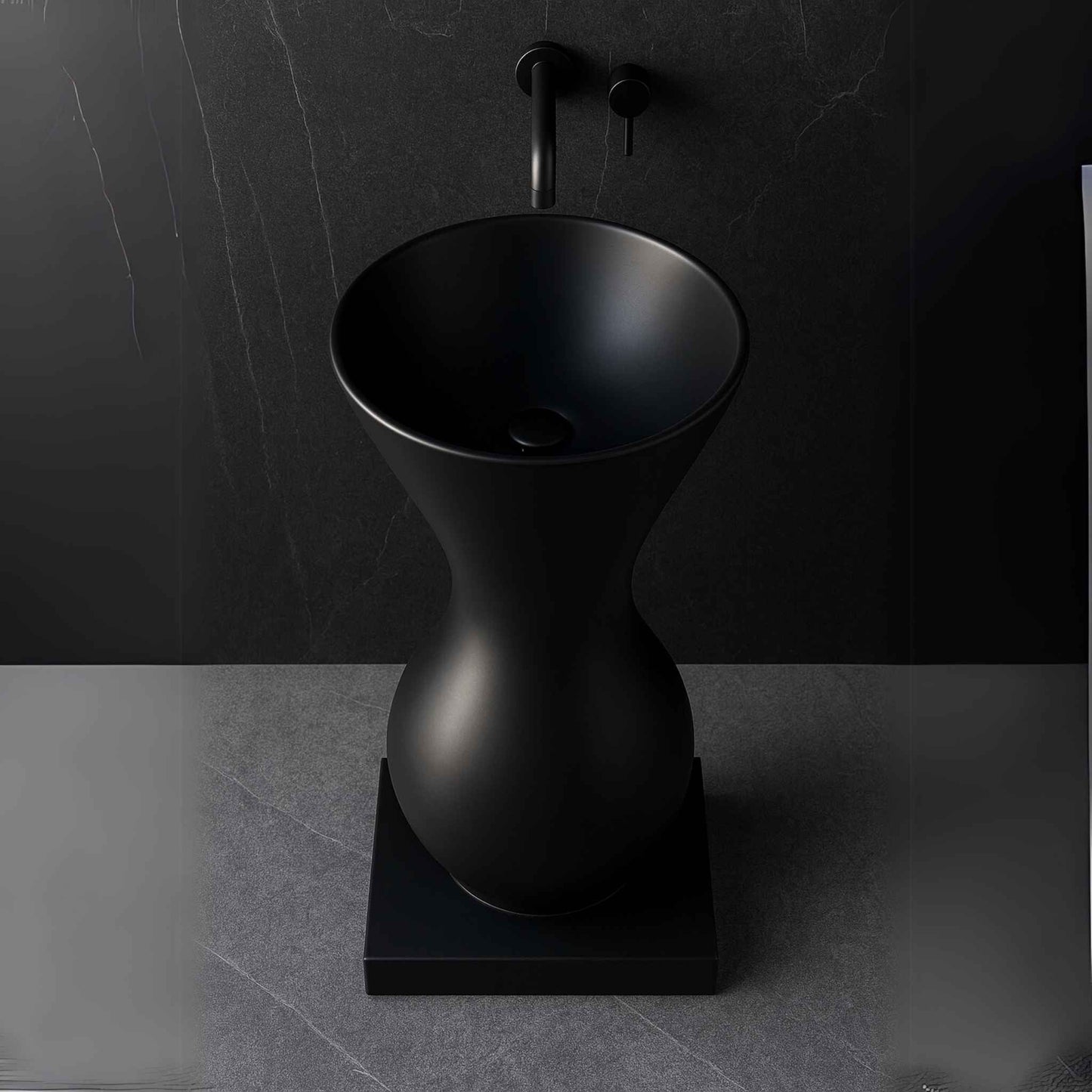 Top-down view of round matte black pedestal basin with wide bowl, perfect for modern luxury spaces.
