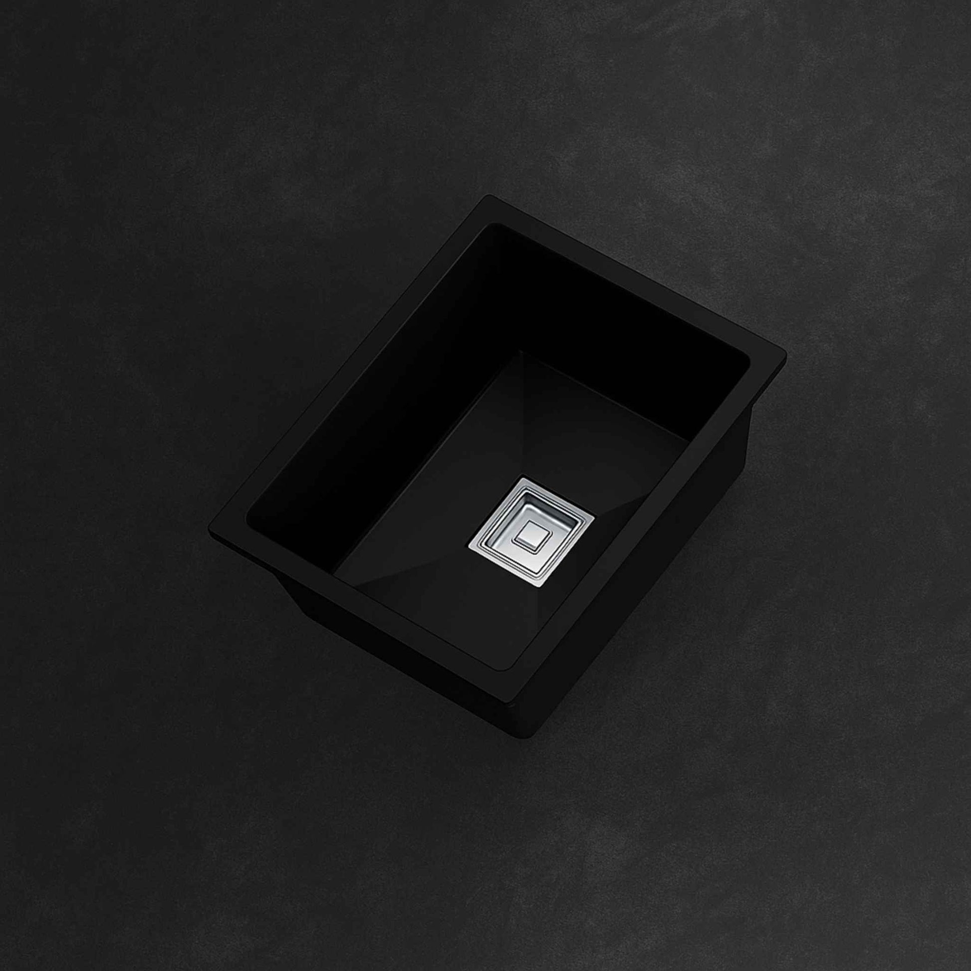 Top view of 18x24x9 matte black metallic kitchen sink in black background