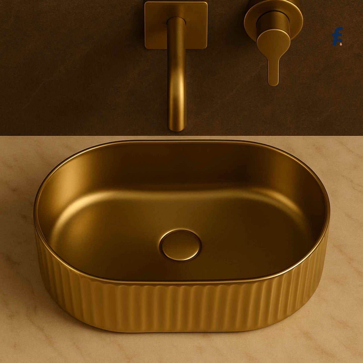 Top angle view of ribbed oval gold washbasin