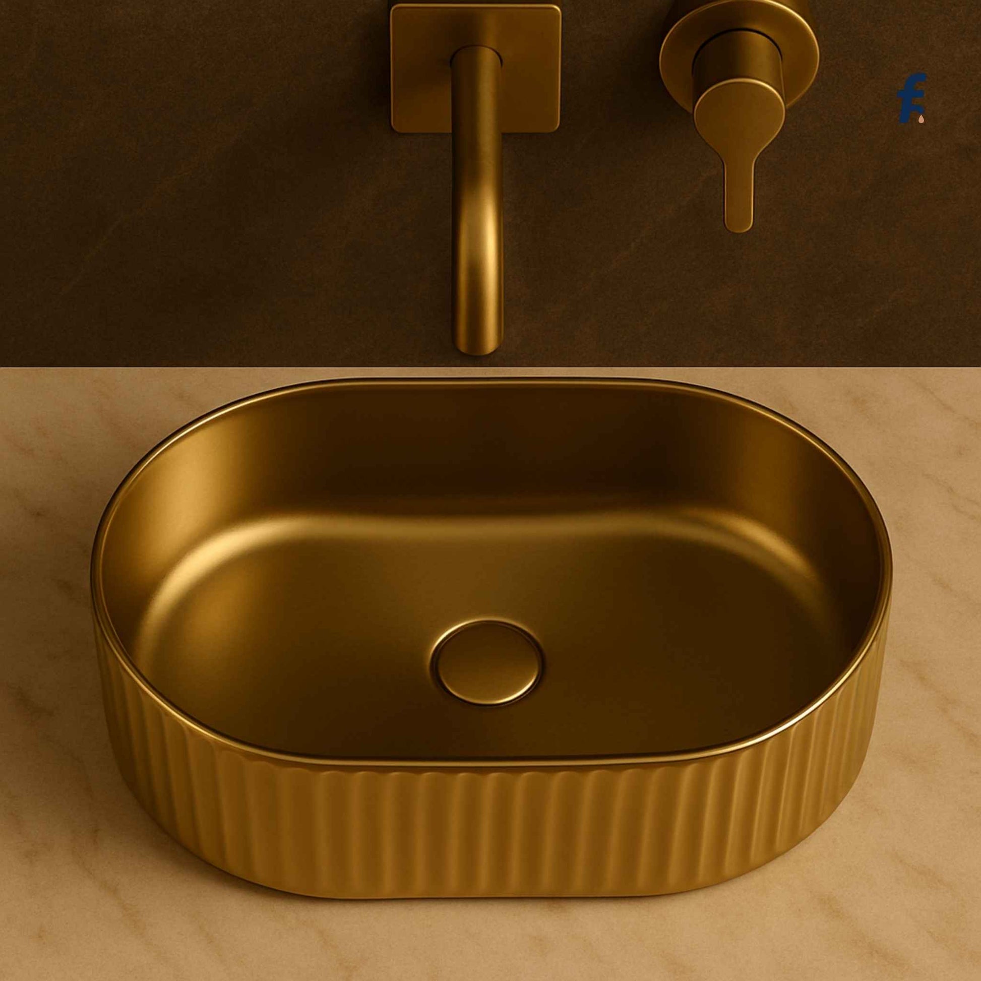 Top angle view of ribbed oval gold washbasin