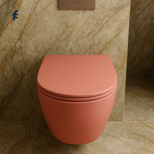 Top view of matte peach toilet on marble background