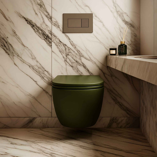 Front angle view of luxury forest green wall-hung toilet in Italian marble bathroom