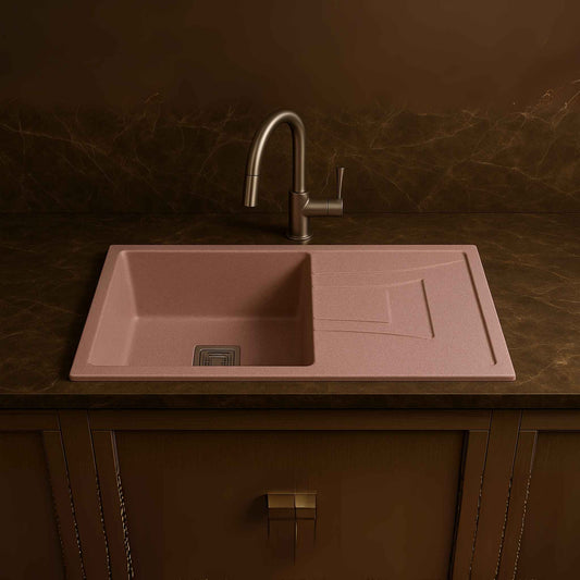 Front-facing rose pink granite kitchen sink with matte finish and drain section