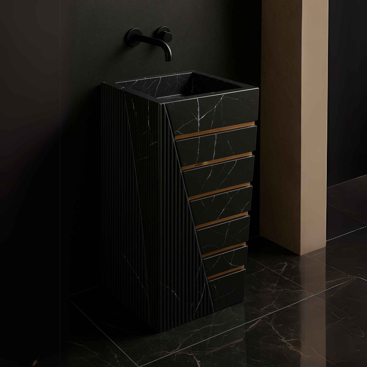 Side angle of black marble freestanding sink showing fluted and slabbed textures