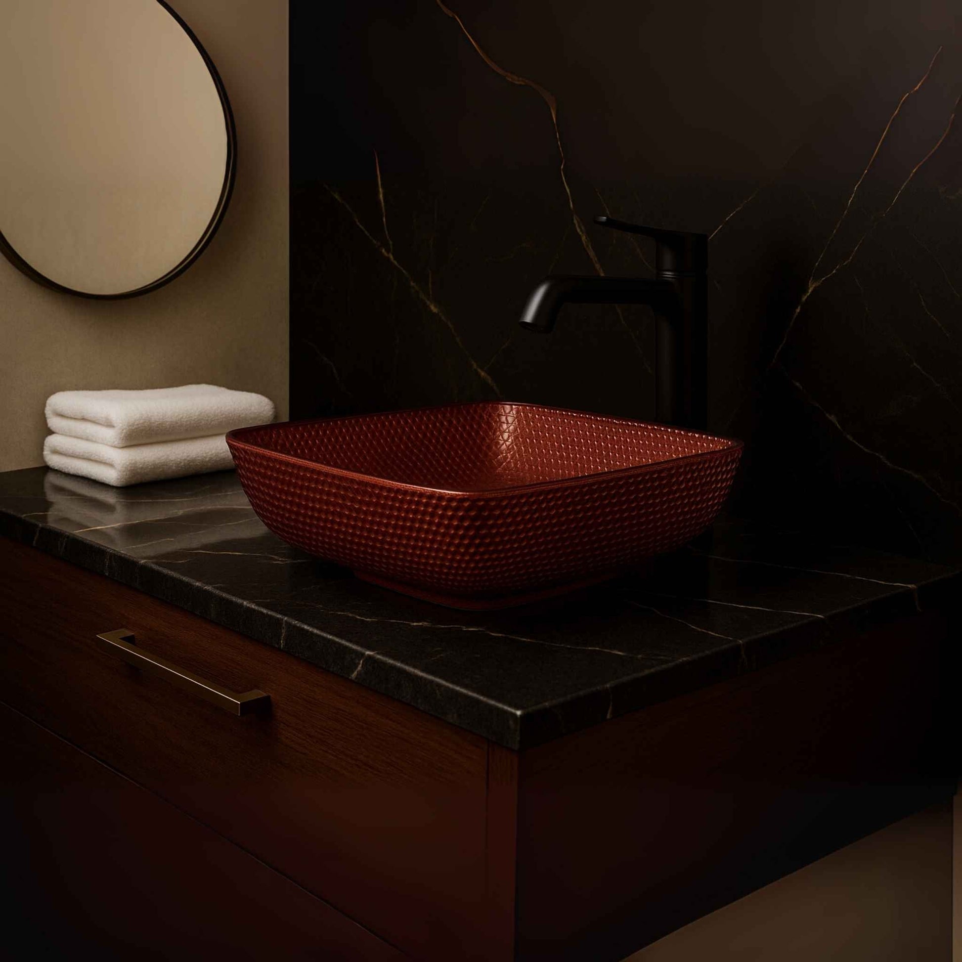  Side profile of square red designer glass wash basin with textured honeycomb finish on marble vanity