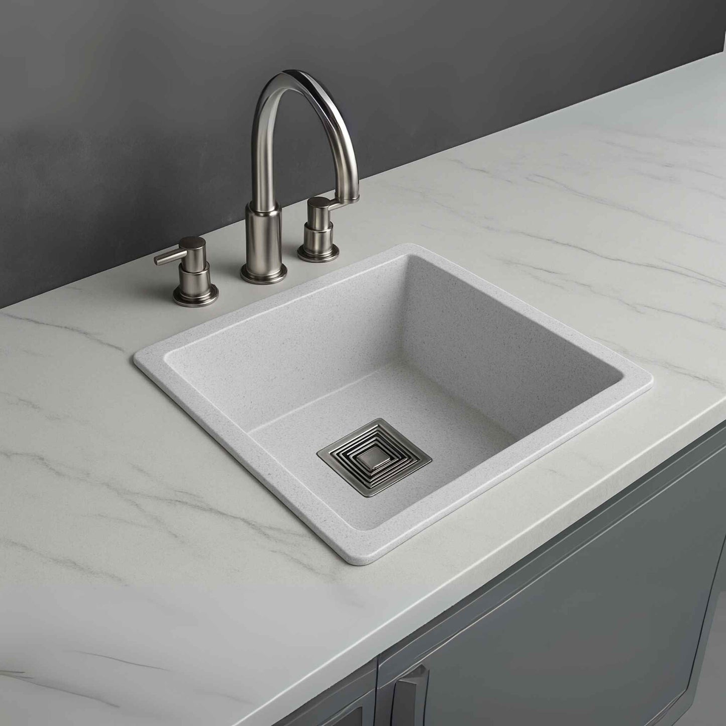 Side angle of white granite kitchen sink with sleek countertop marble design