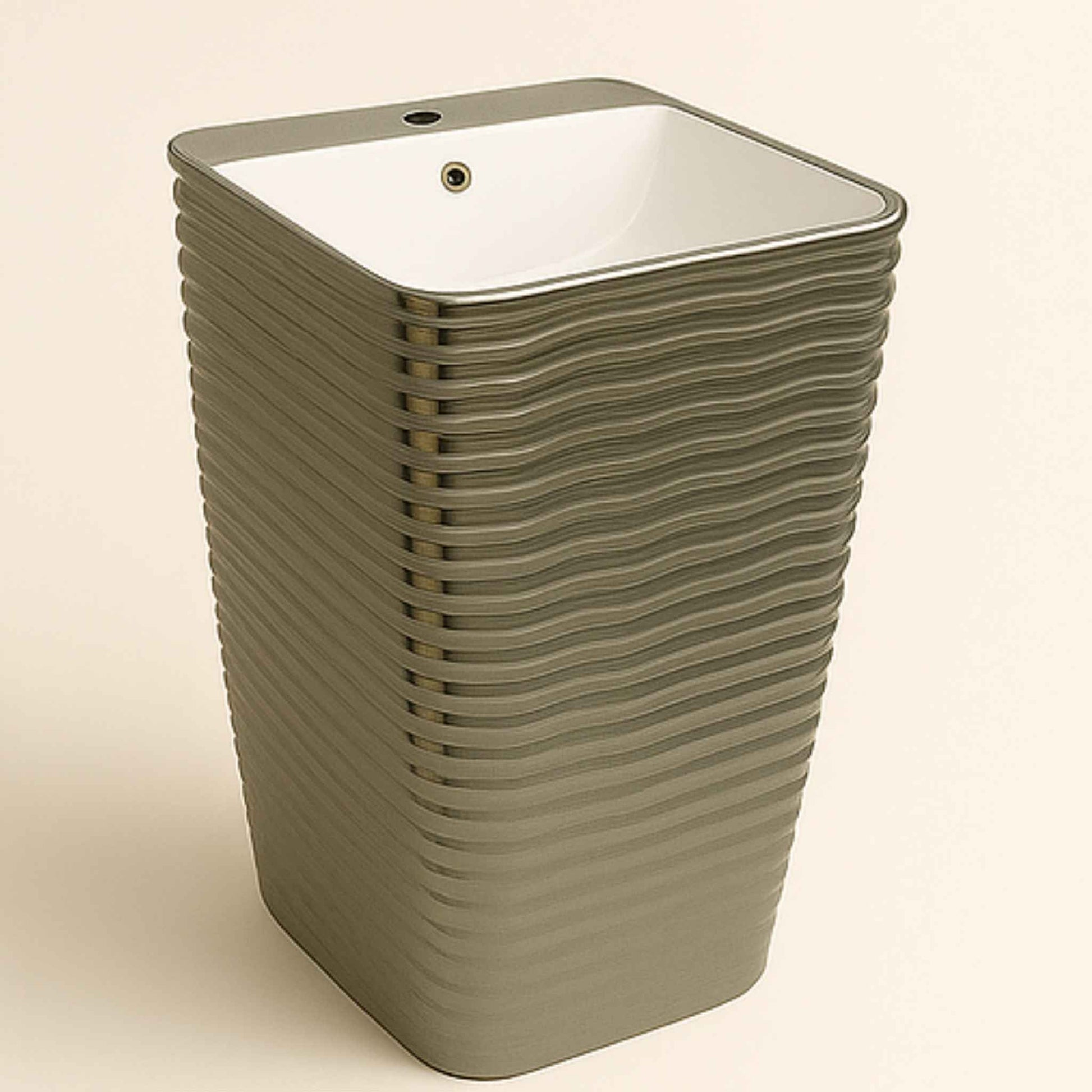 Side angle showing horizontal ripple finish on silver pedestal basin