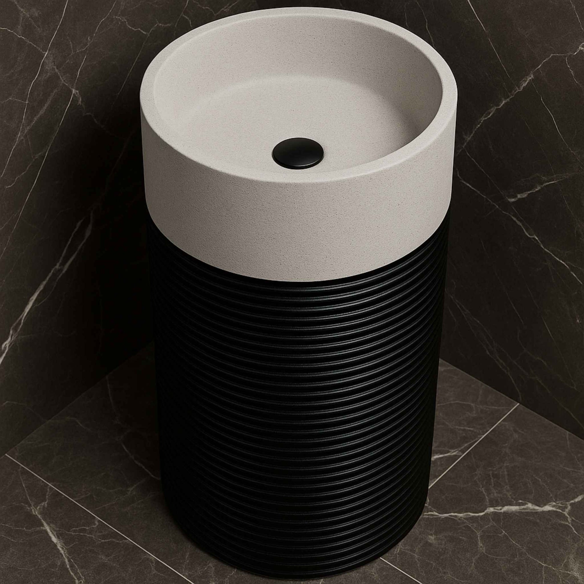 Top view of round white basin with black ribbed cylindrical body