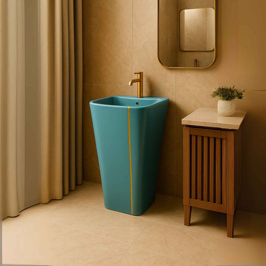 Turquoise pedestal basin with golden accent placed in luxury bathroom interior