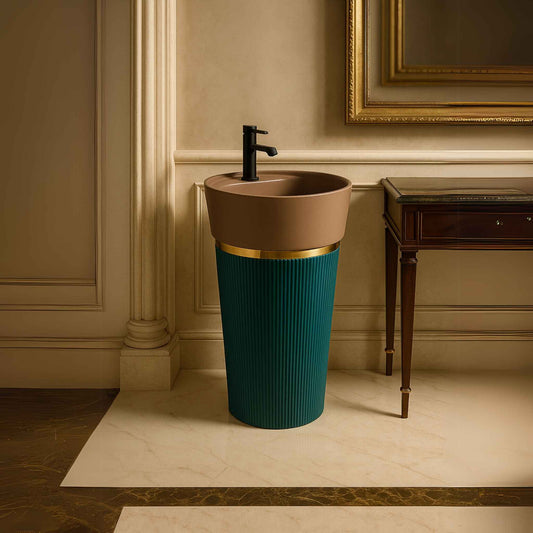 Two-tone designer pedestal washbasin with beige glossy bowl and teal ribbed base for luxury bathrooms.