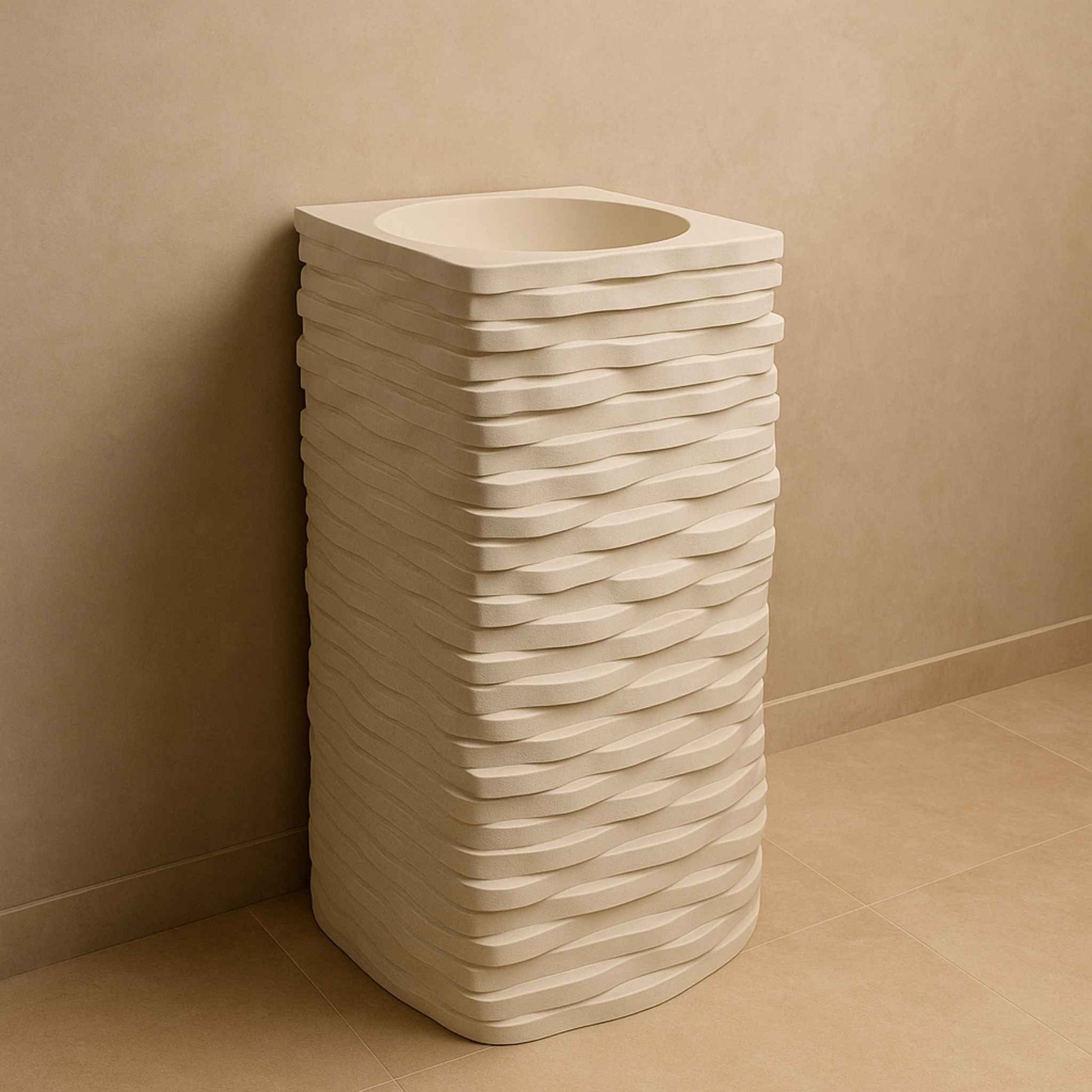 Front view of wave-textured off-white pedestal basin