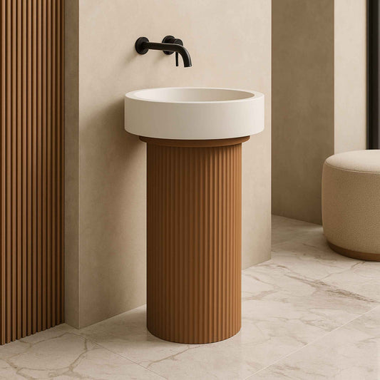 Side angle of freestanding fluted basin with faucet attached to wall