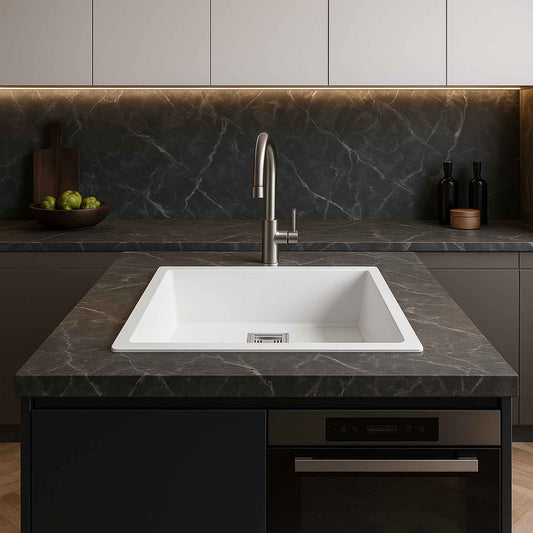 Full modern kitchen featuring 18x24x9 white granite sink with dark Satvario marble countertop.