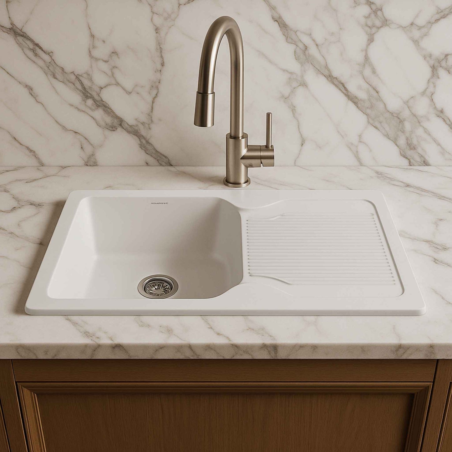Front angle of white granite sink installed in satvario kitchen