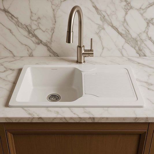Front angle of white granite sink installed in satvario kitchen