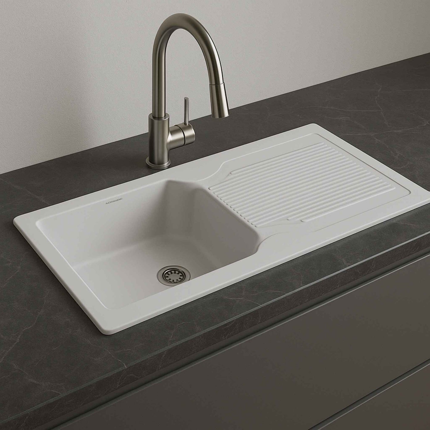 Side view of white quartz granite sink with grey marble background