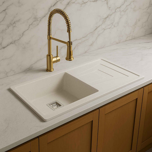 Side angle of white quartz kitchen sink with modern marble countertop and luxury faucet